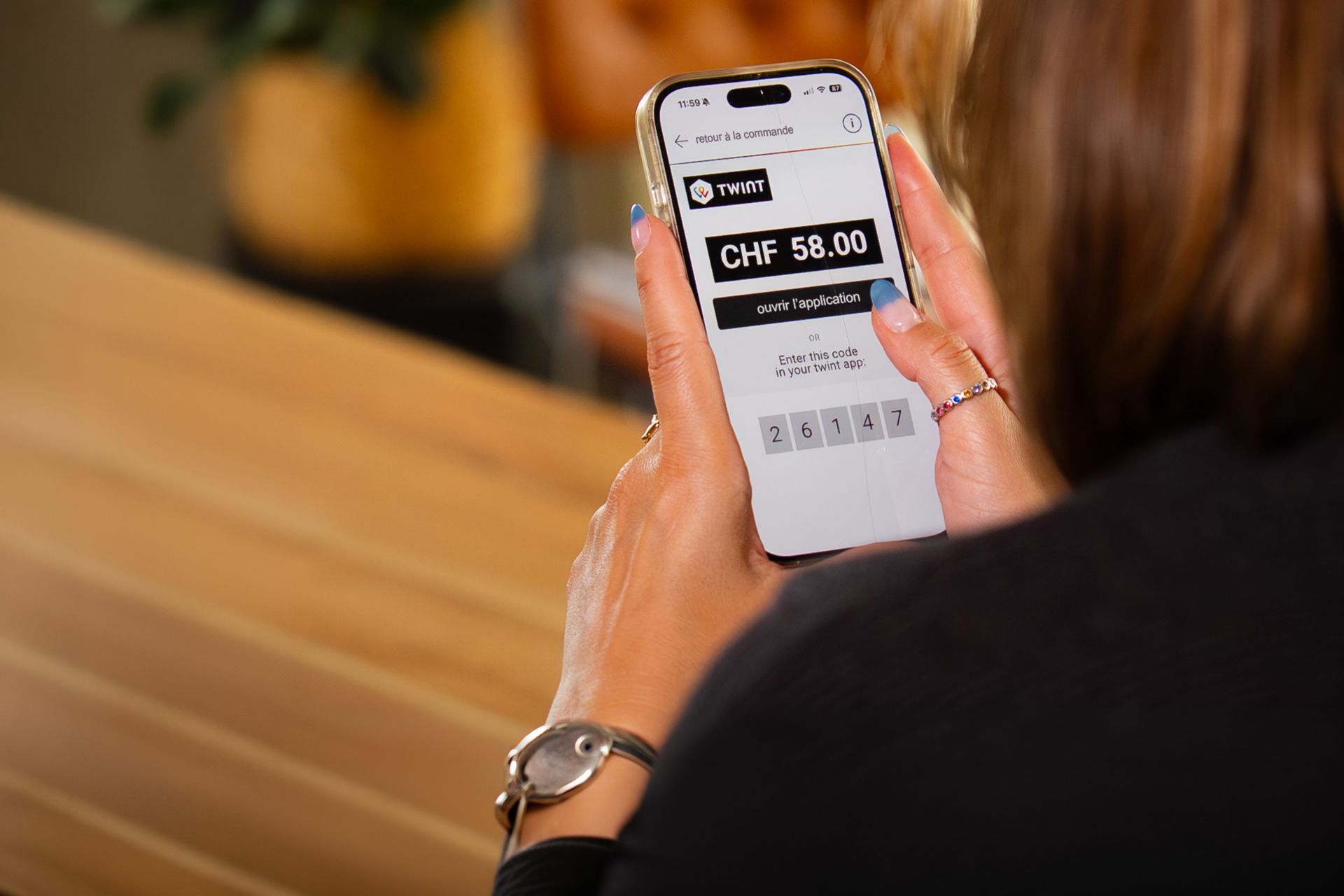 Ecran de téléphone portable avec app TWINT et code à 5 chiffres